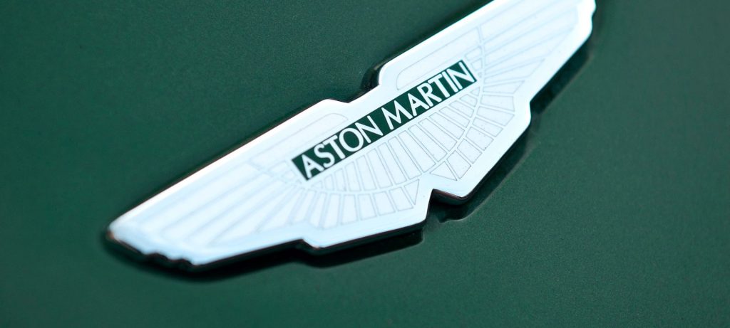 Aston Martin logo on green background
